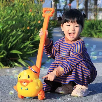 צהוב קטן ברווז בועה העגלה קריקטורה חמוד חשמלי מכונת הבועות עם נייד חיצוני דוחף צעצוע לילדים מתנת יום הולדת.